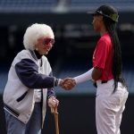 Women’s baseball league tryouts link generations